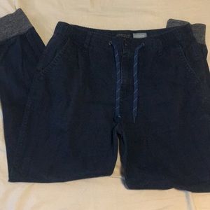 Blue joggers with grey bottoms cuffs